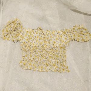 Bright yellow floral cropped top